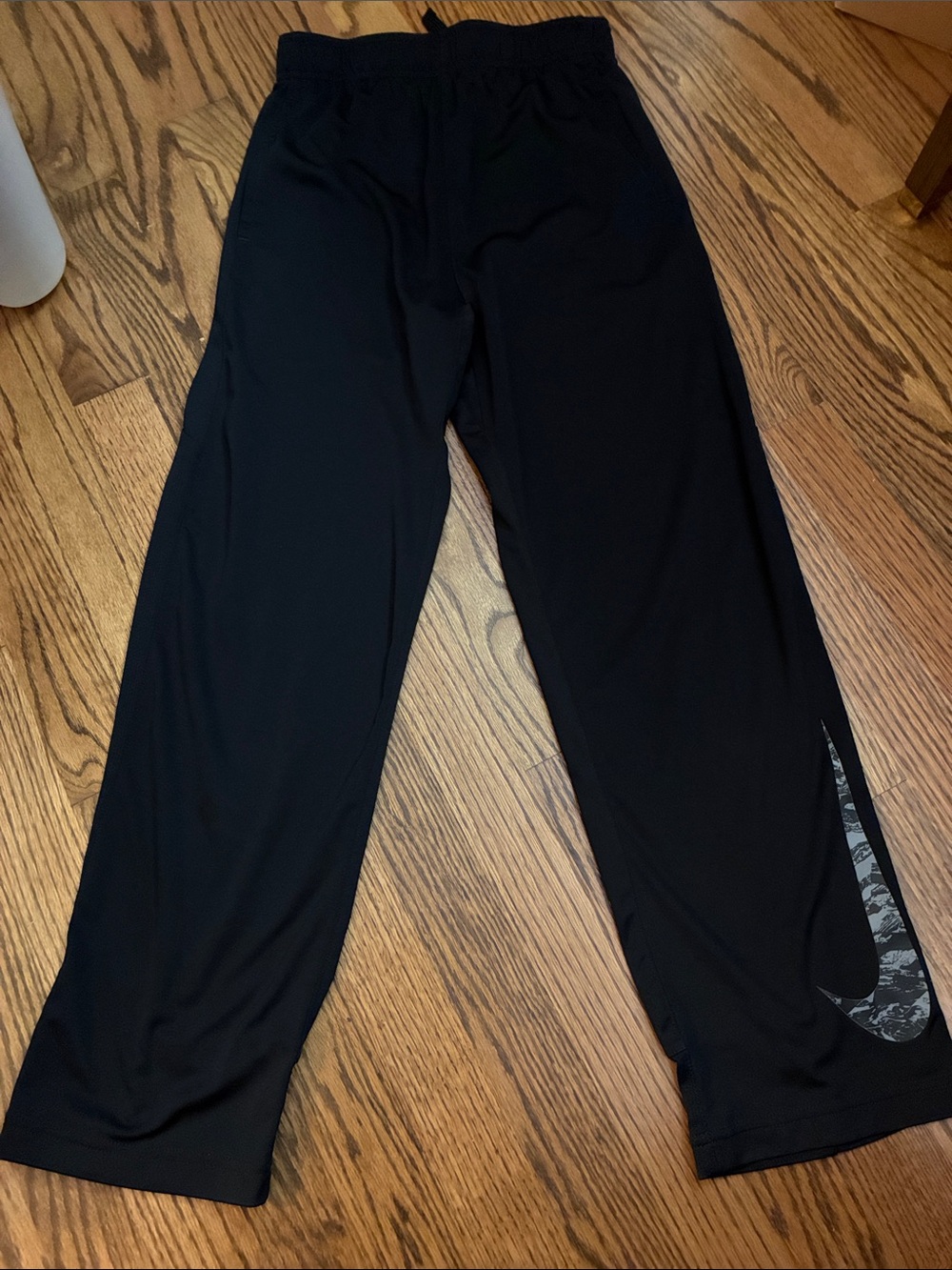 Nike black athletic pants size large kids Camouflage Swoosh mesh side panel legs